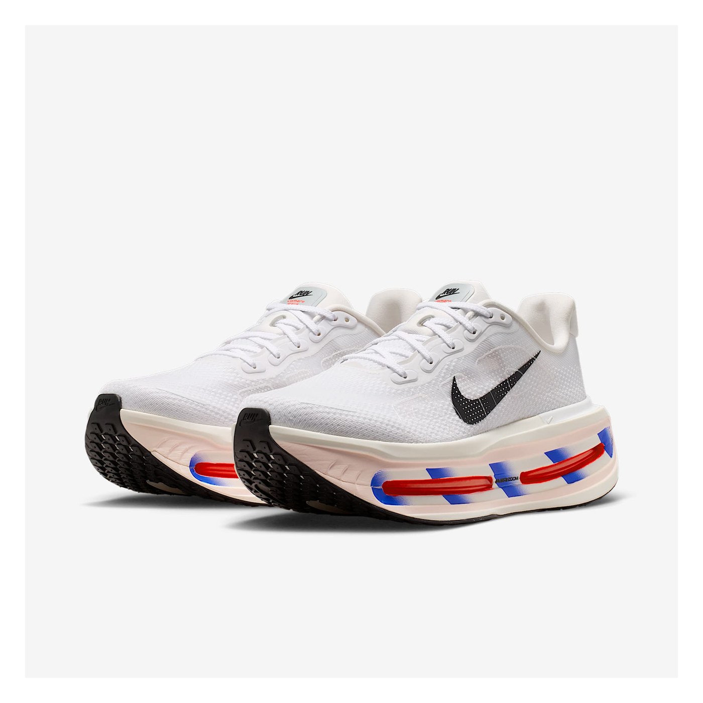 Nike Vomero Premium vue 3/4 face paire Blanc Racer Blue Bright Crimson