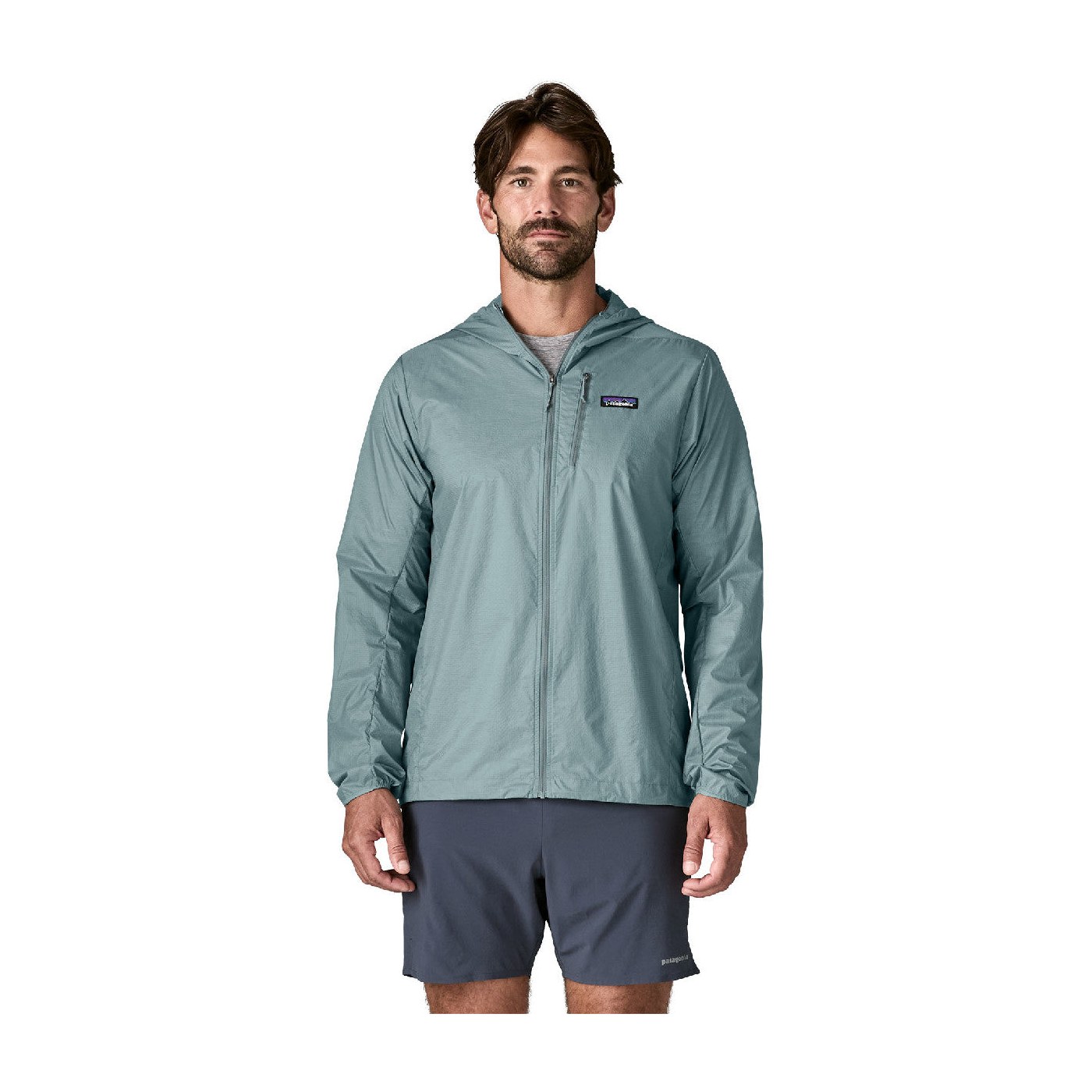 Patagonia Houdini Jacket packée dans sa poche poitrine