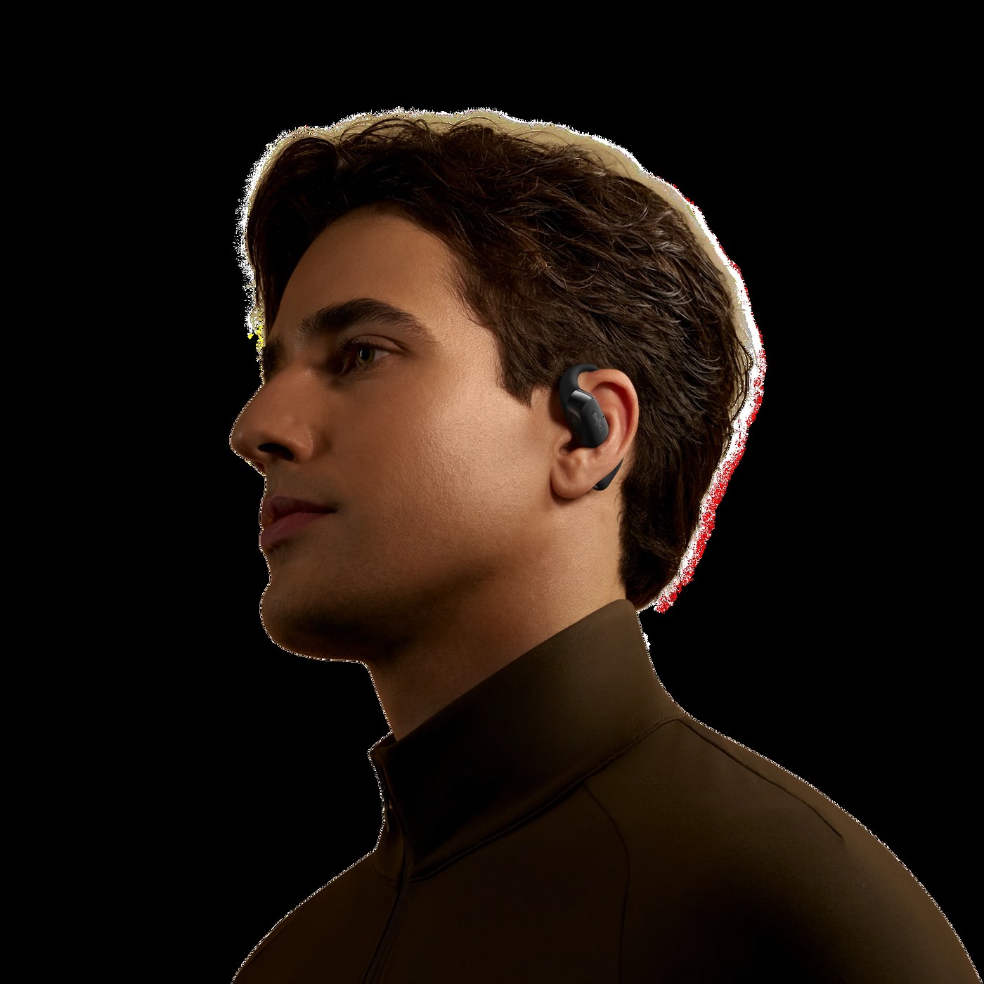 Coureur portant les Shokz OpenFit 2 open-ear, vue de profil